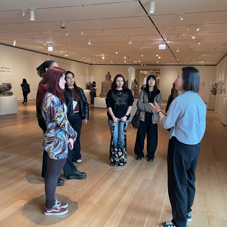 Dr. Seunghee Oh speaks with students