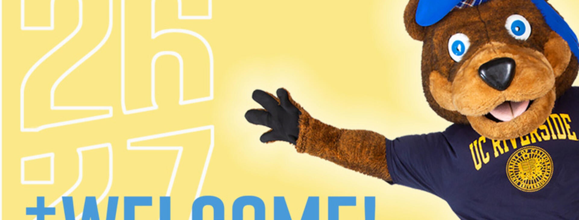 UC Riverside mascot, Scotty the Bear, wearing a blue beret and university t-shirt with arm outstretched against a yellow background reading "26 27 + WELCOME!".